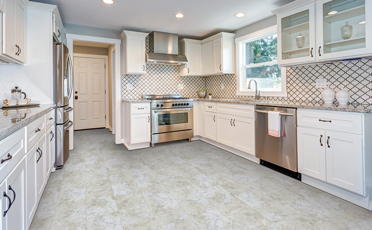 oversized tile in kitchen with patterned backsplash